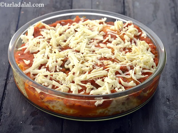 Step 43 – Finally sprinkle the cheese over it.