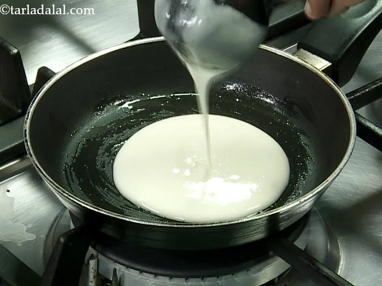 Step 6 – Pour a ladleful of the batter.