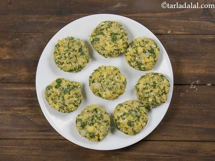 Step 12 – Divide the mixture into 8 portions. Take one portion and shape it into a 50 …