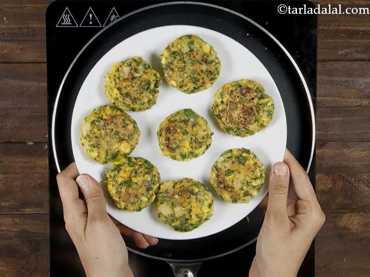 Step 17 – Flip the&nbsp;<b><span style="font-size: 12pt; font-family: Cambria;">corn methi kebab recipe | &nbsp;corn methi tikki</span></b><span style="font-size: 12pt; …