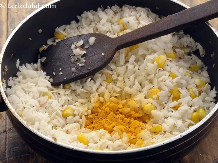 Step 10 – Add turmeric powder.