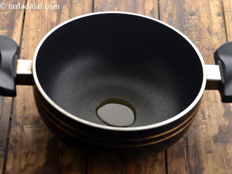 Step 10 – Next for the tempering of the <strong>Corn Sambhar for Kids</strong>, heat &frac12; tsp of ghee …