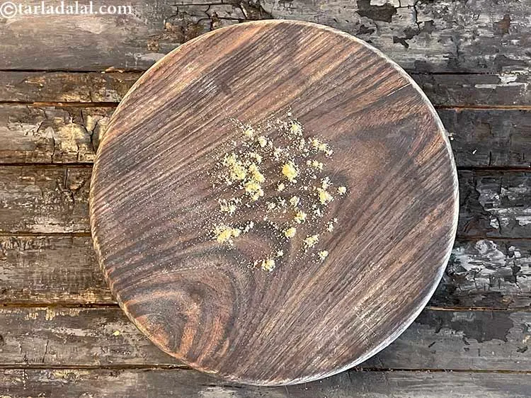 Step 13 – <meta charset="UTF-8" /> Sprinkle a little maize flour on the rolling surface.&nbsp;