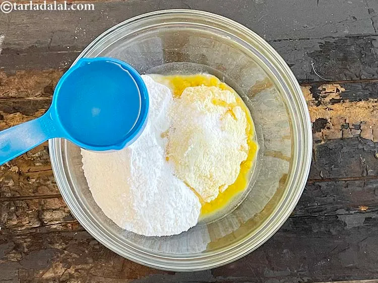 Step 7 – Add enough warm water to make a dough. We have used 3/4 cup of water.