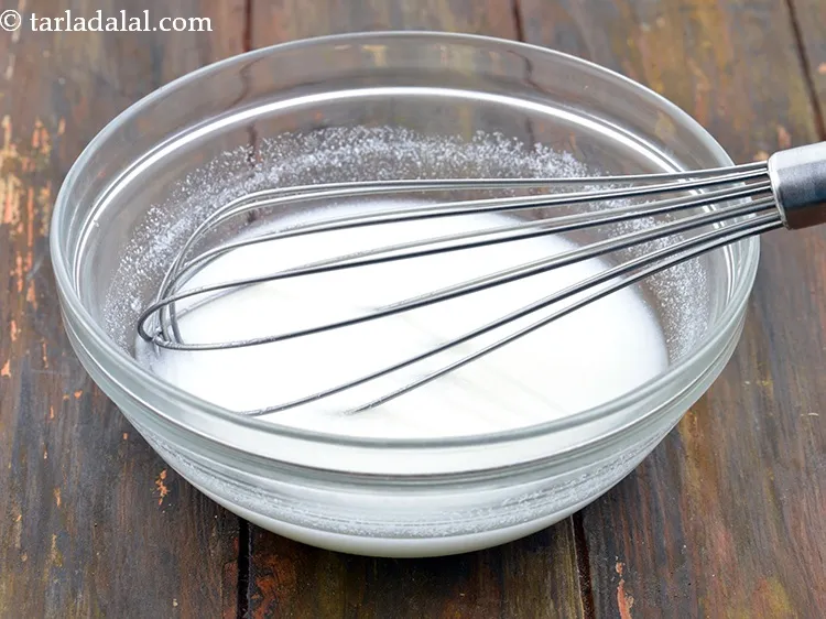 Step 23 – Add curd-water mixture.