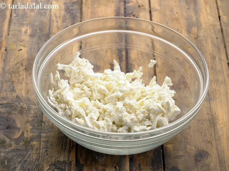 Step 17 – To prepare the cottage cheese tomato filling, in a deep bowl grate fresh paneer block. …