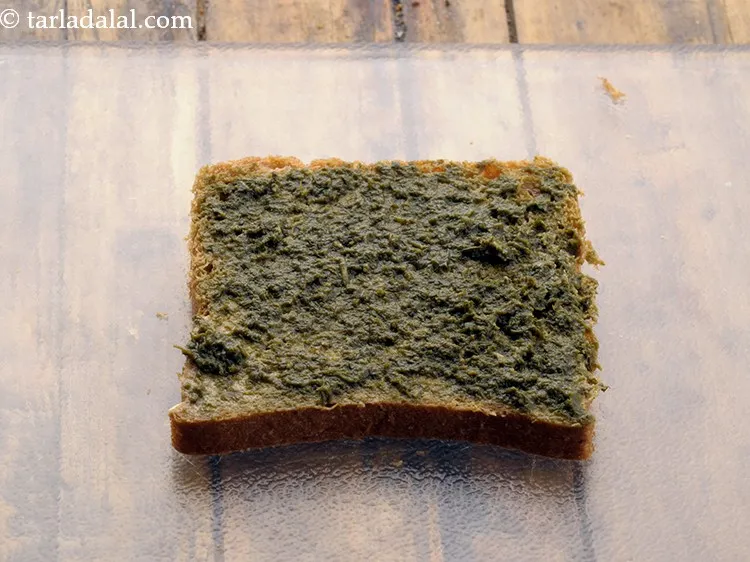 Step 23 – Place one bread slice on a flat, dry surface with the buttered-chutney side facing upwards.