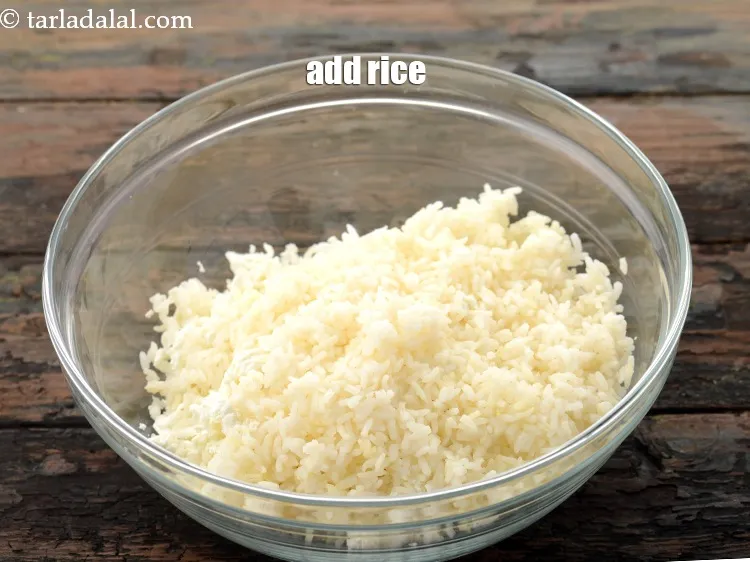 Step 8 – Add 1/2 cup&nbsp;<a href="https://www.tarladalal.com/cooked-rice--chawal-32639r">cooked rice (chawal)</a>, you can use leftover rice as well.&nbsp;