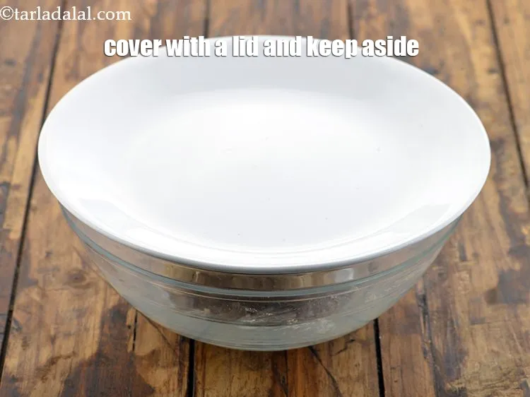 Step 17 – Cover with a lid and keep the kneaded dough aside.