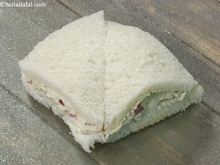 Step 15 – Cut each vegetarian cream cheese sandwich diagonally into 2 and serve.