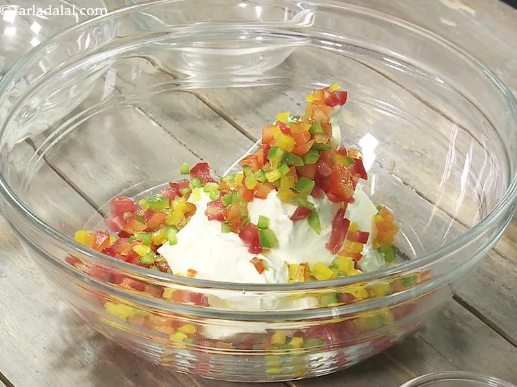 Step 4 – Add finely chopped capsicum. We have used all three variants viz, red , yellow and …