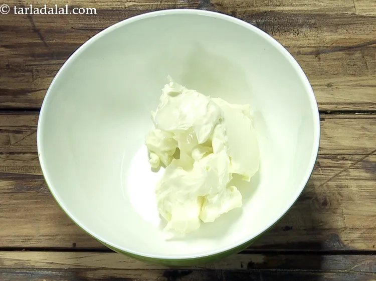 Step 3 – To make cream cheese mixture, add 4 tbsp&nbsp;<a href="https://www.tarladalal.com/cream-cheese-1108r">cream cheese</a> in a bowl.&nbsp;