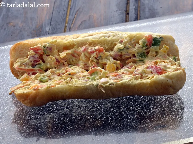 Step 15 – Spread 1 tbsp of the cream cheese mixture on each side of the hot dog …