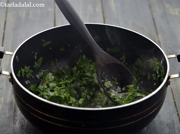 Step 14 – Saut&eacute; the spinach on a medium flame for 1 minute. If cooked for more time, …