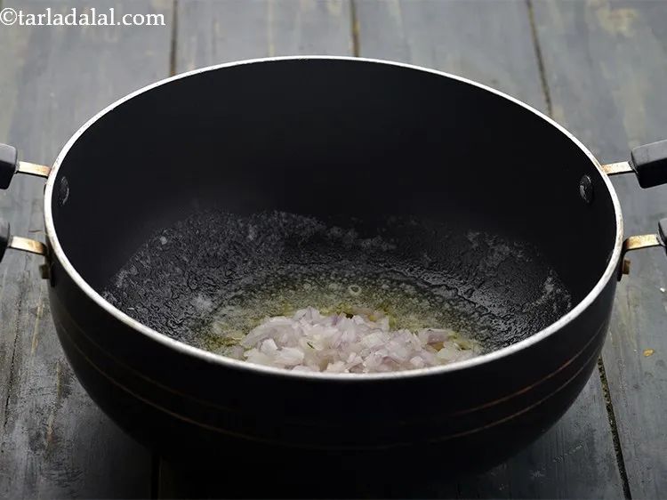 Step 14 – Add the onions.