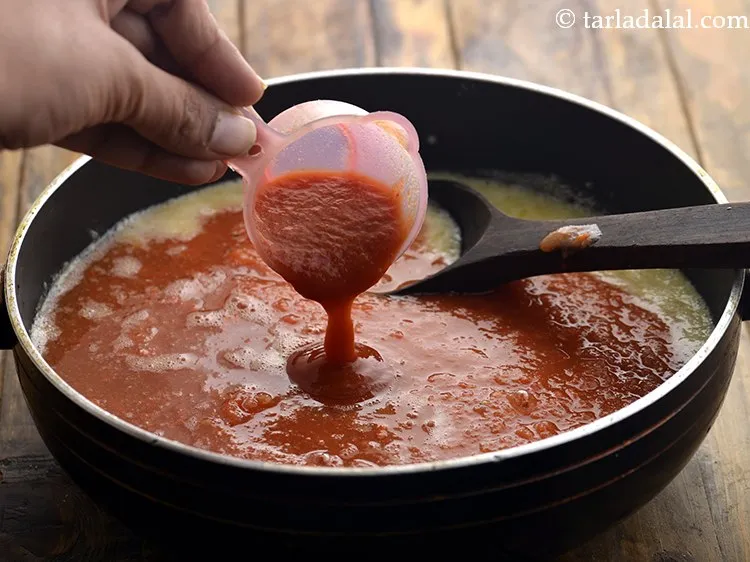 Step 16 – Add tomato pur&eacute;e