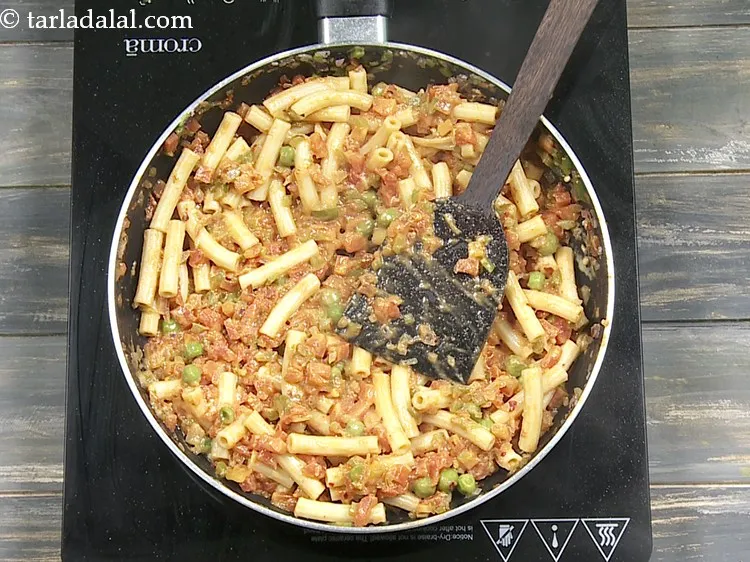 Step 19 – Mix gently and cook on a medium flame for 2 minutes, while stirring occasionally.&nbsp;