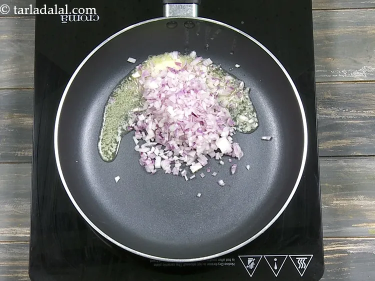 Step 4 – Add 1/2 cup&nbsp;finely&nbsp;<a href="https://www.tarladalal.com/glossary-chopped-onions-722i">chopped onions</a>.