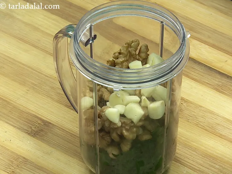 Step 21 – Add roughly chopped garlic.