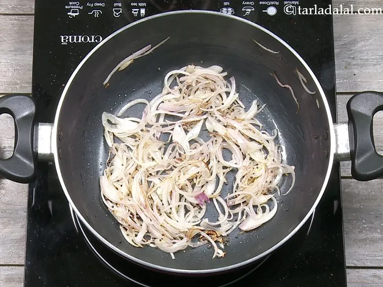Step 10 – Saut&eacute; the onions on a medium flame for 5 minutes. They will turn light brown …