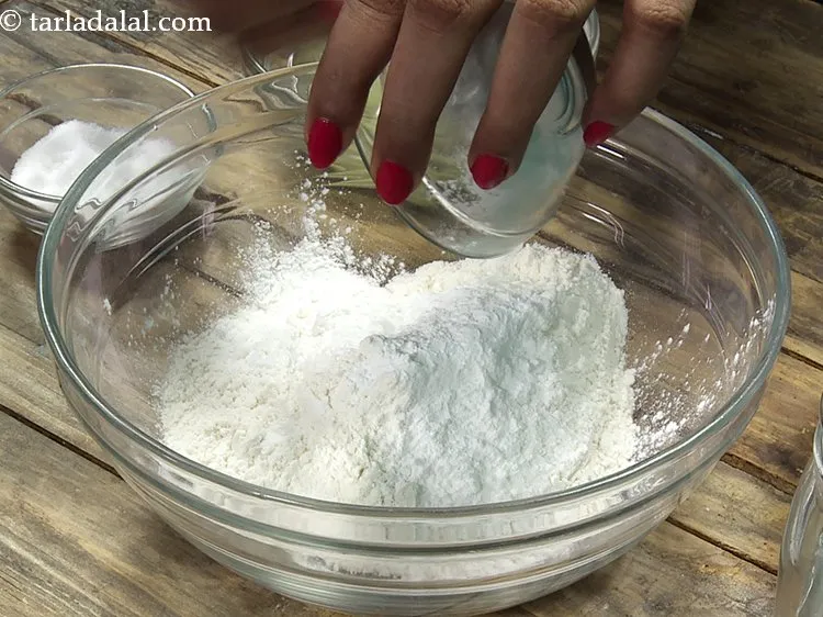 Step 12 – Add cornflour.&nbsp;Cornflour helps in making cauliflower cripsier on frying.