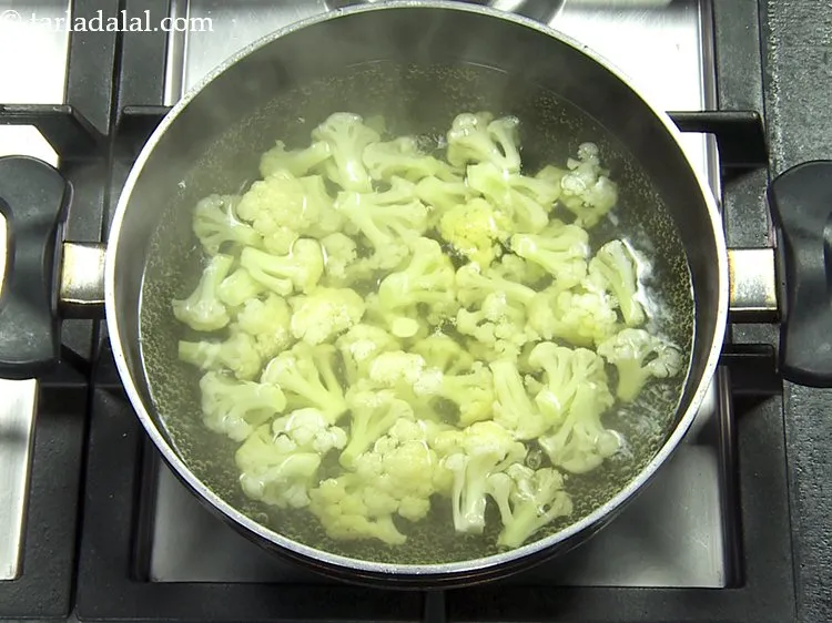 Step 9 – Parboil the cauliflower florets in salted water. Parboiling not only improves the texture of cauliflower …