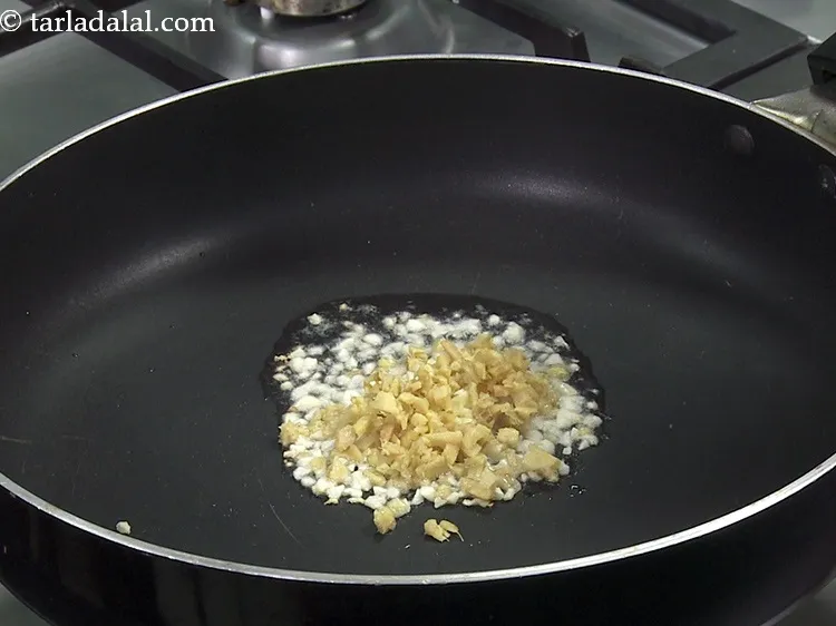 Step 23 – Add 2 tsp&nbsp;finely&nbsp;<a href="https://www.tarladalal.com/glossary-chopped-ginger-786i">chopped ginger (adrak)</a>.