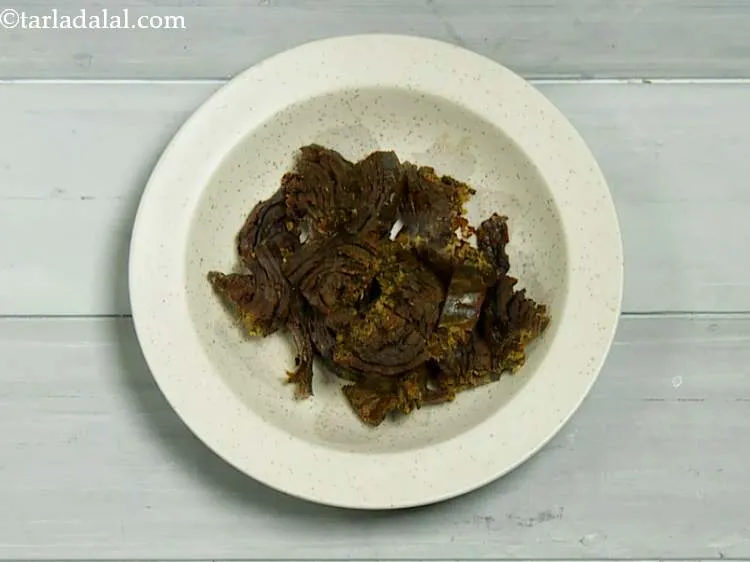 Step 5 – Place the deep-fried patra pieces on a serving plate.