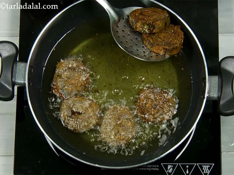 Step 2 – Heat the oil in a deep non-stick pan, and deep-fry a few patra pieces at …