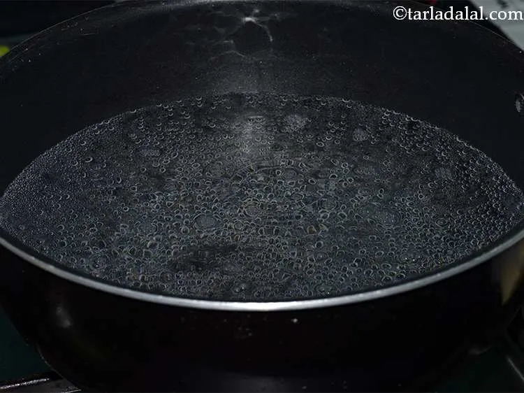 Step 4 – In a deep non-stick pan, heat water and bring to a vigorous boil.
