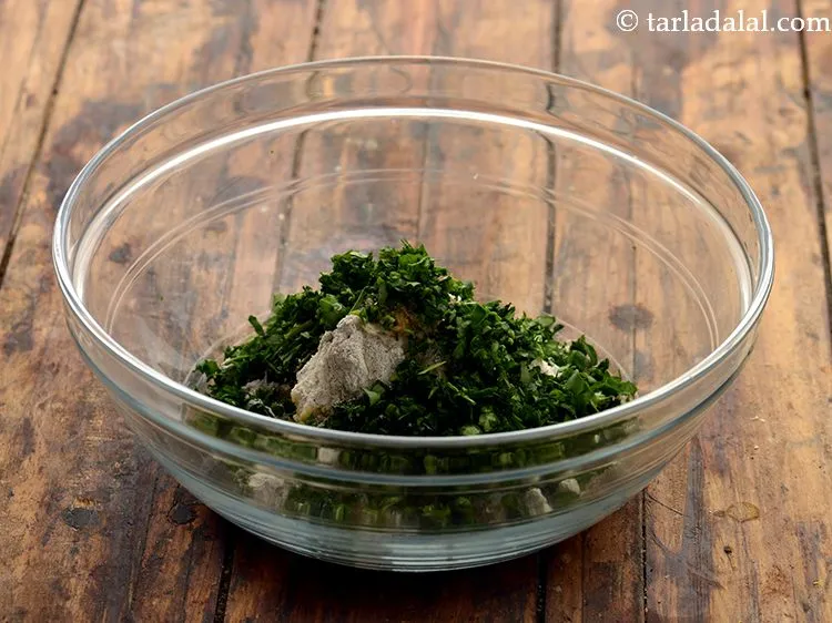 Step 11 – Add some greens like finely chopped fenugreek leaves to it.