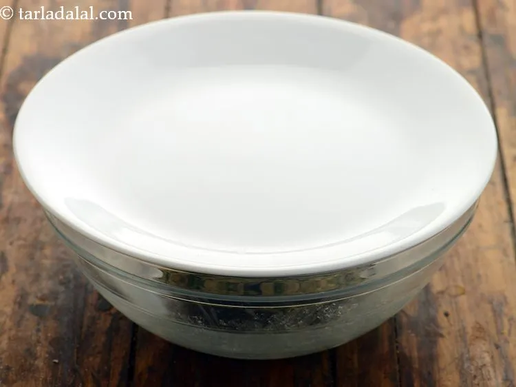 Step 18 – Cover the dough with a damp muslin cloth or a lid and keep aside for …