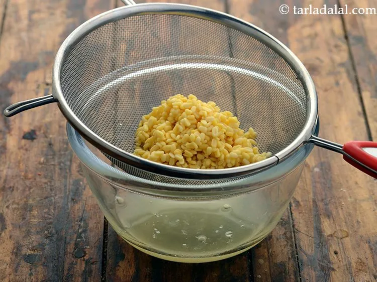 Step 3 – After &frac12; hour, drain the excess water using a strainer.