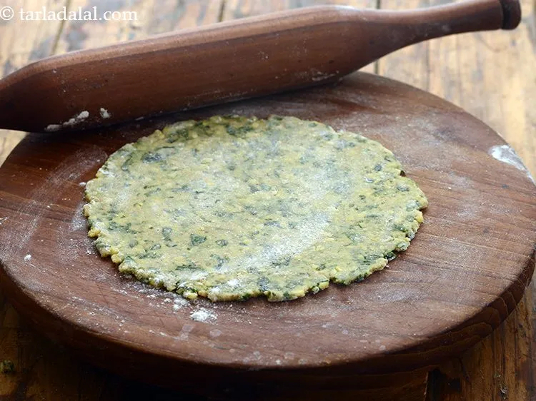 Step 20 – Roll a portion into a 150 mm. (6&rdquo;) diameter circle using wheat flour.