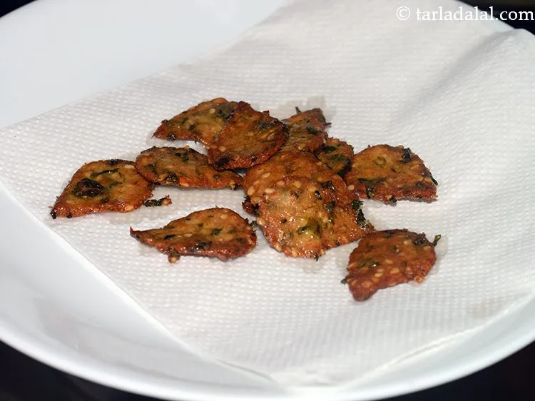 Step 25 – Drain on absorbent paper and keep aside to cool completely. They will turn crisp on …