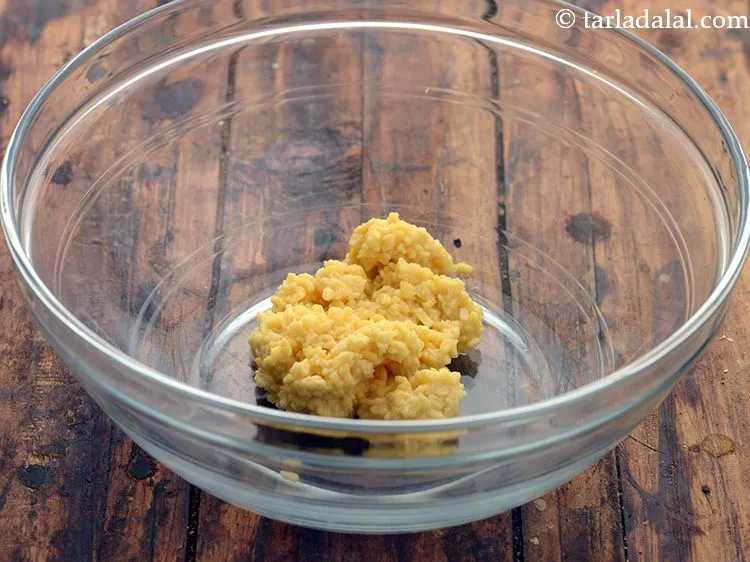Step 6 – Transfer this coarse moong dal into a deep bowl.