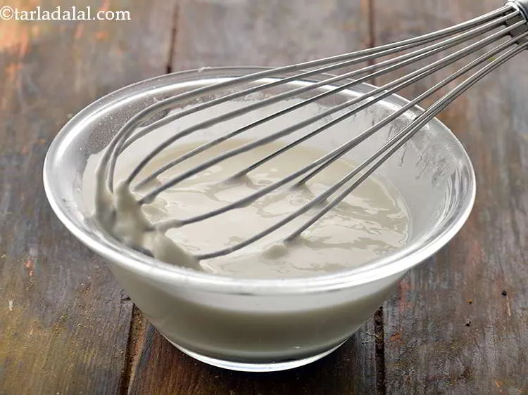 स्टेप 13 – एक कटोरी में लगभग ३/४ कप पानी डालें। अच्छी तरह …