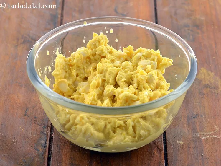 Step 17 – Add 1 1/2 cups&nbsp;coarsely&nbsp;<a href="https://www.tarladalal.com/glossary-crushed-sweet-corn-kernels-1605i">crushed sweet corn kernels (makai ke dane)</a>.