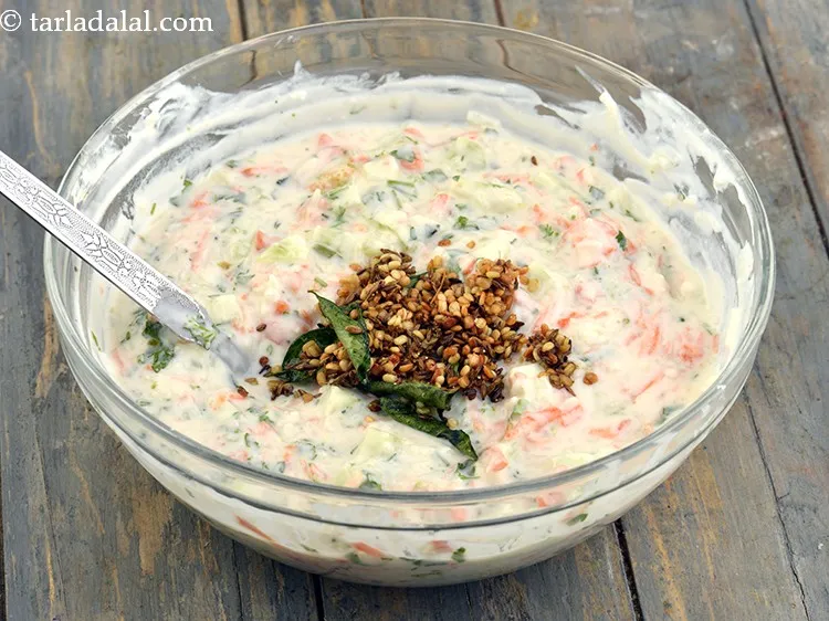 Step 20 – Pour the tempering over the rice mixture and mix well.