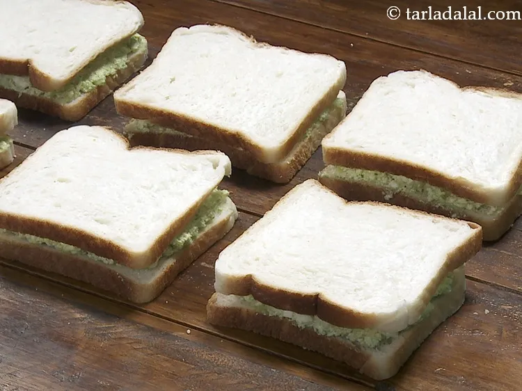Step 40 – Cover with the remaining 6 bread slices and press them lightly.