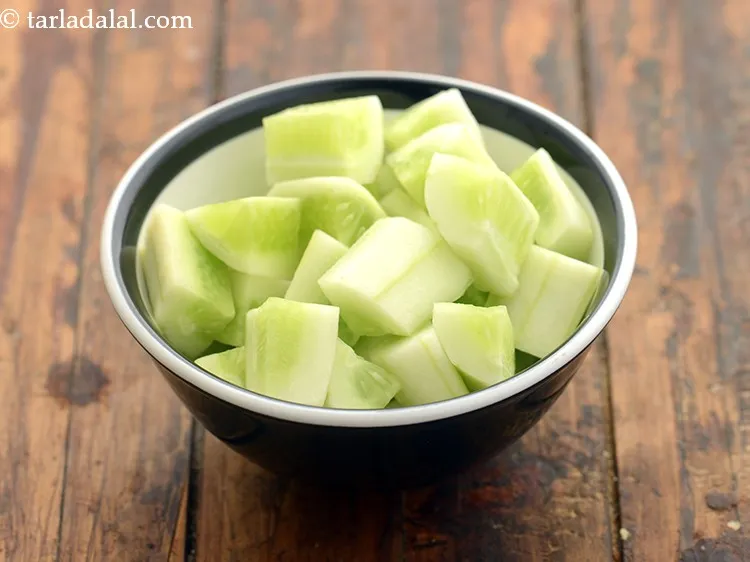 Step 30 – Add 1/2 cup&nbsp;<a href="https://www.tarladalal.com/glossary-cucumber-cubes-726i">cucumber cubes</a>