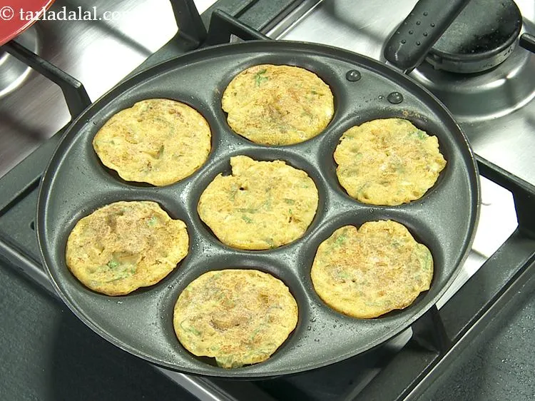 Step 14 – Cook <strong>cucumber pancakes |&nbsp;Indian savoury cucumber pancakes&nbsp;|&nbsp;cucumber chilla&nbsp;|&nbsp;cucumber thalipeeth&nbsp;</strong>| on both the sides using &frac12; …