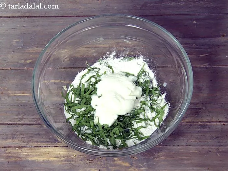 Step 7 – Add <meta charset="UTF-8" />2 tbsp&nbsp;fresh&nbsp;<a href="glossary-curd-dahi-yogurt-yoghurt-383i">curd (dahi)</a>. They help in making cucumber pancakes soft.