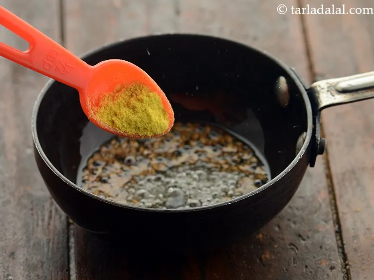 स्टेप 12 – हींग डालें।