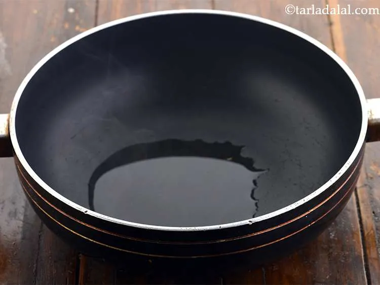 Step 19 – To make&nbsp;<strong>Curd at home using Buffalo milk</strong>, rinse a deep non-stick pan with 2 tbsp …