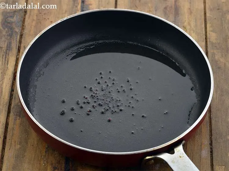 Step 11 – Add the mustard seeds and let them splutter.