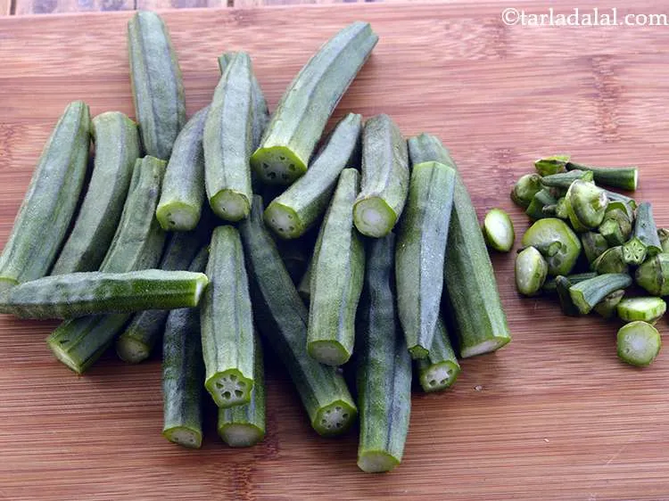 Step 4 – Remove the top and the bottom end of the okras.
