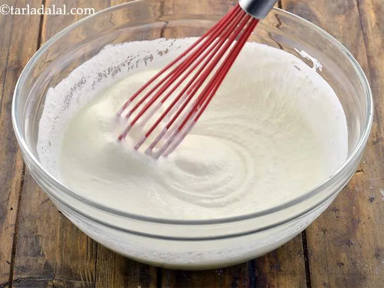 Step 2 – Whisk the curd with the salt to taste and keep aside.