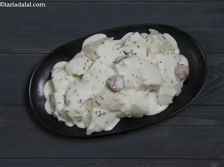 Step 13 – Pour the tempered curd mixture evenly over it. This is a quick version of&nbsp;<strong>Dahi Idli …