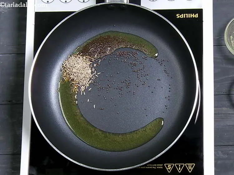 Step 6 – Add the mustard seeds and cumin seeds. You can also add chana dal and urad …